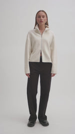 Load and play video in Gallery viewer, Second Female - Alvera Zip T Neck Knit - Vaporous White
